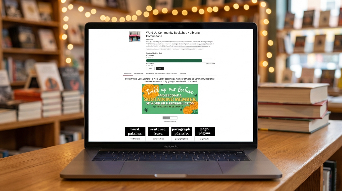 Laptop on a bookstore counter showing a membership drive page with progress bar